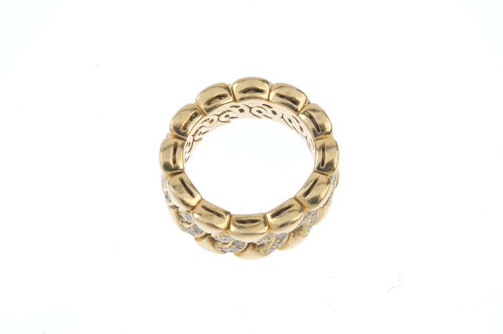 BULGARI - an 18ct gold diamond ring. Of flexible design, the brilliant-cut diamond, circular-shape - Image 2 of 2