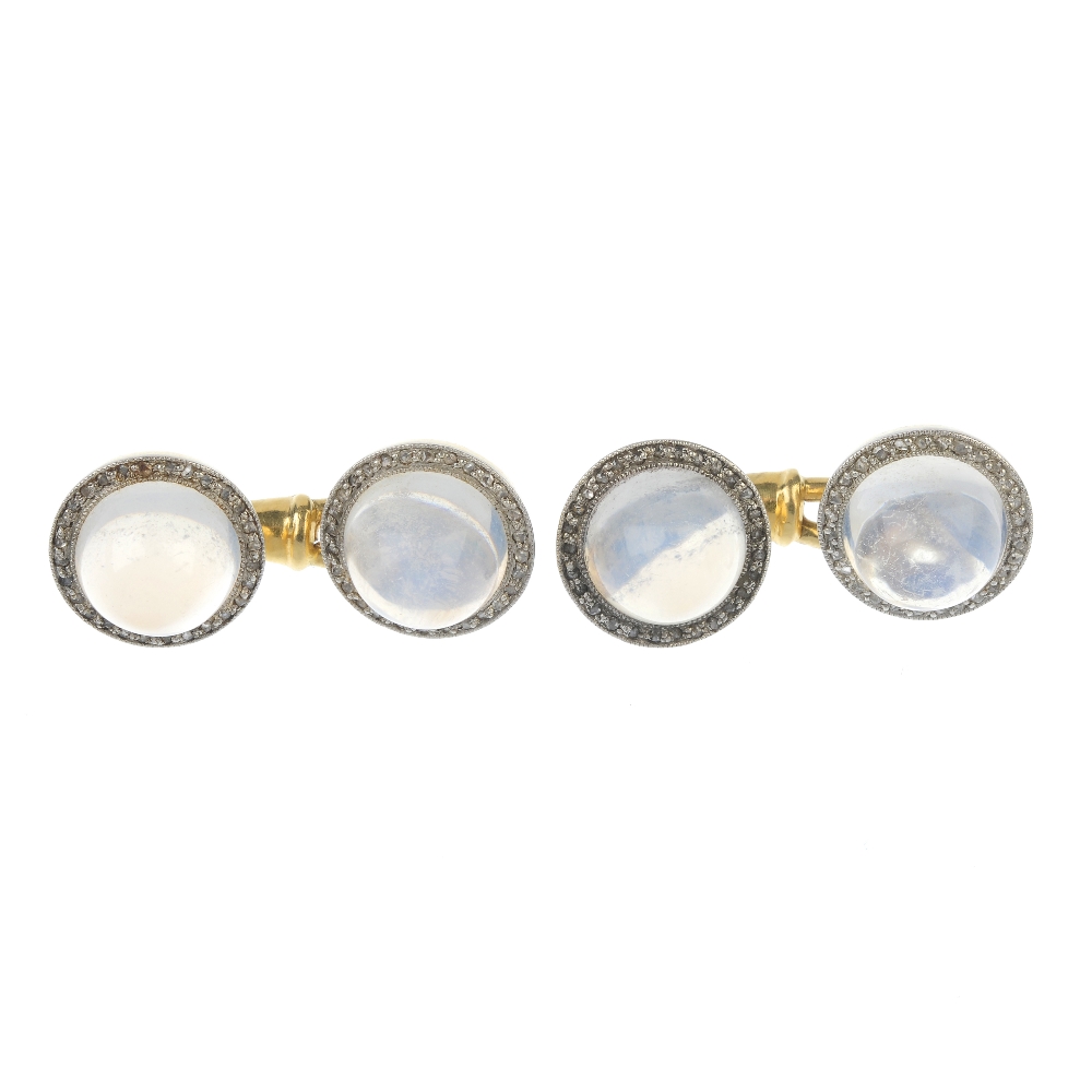 A pair of early 20th century moonstone and diamond cufflinks. Each designed as a circular