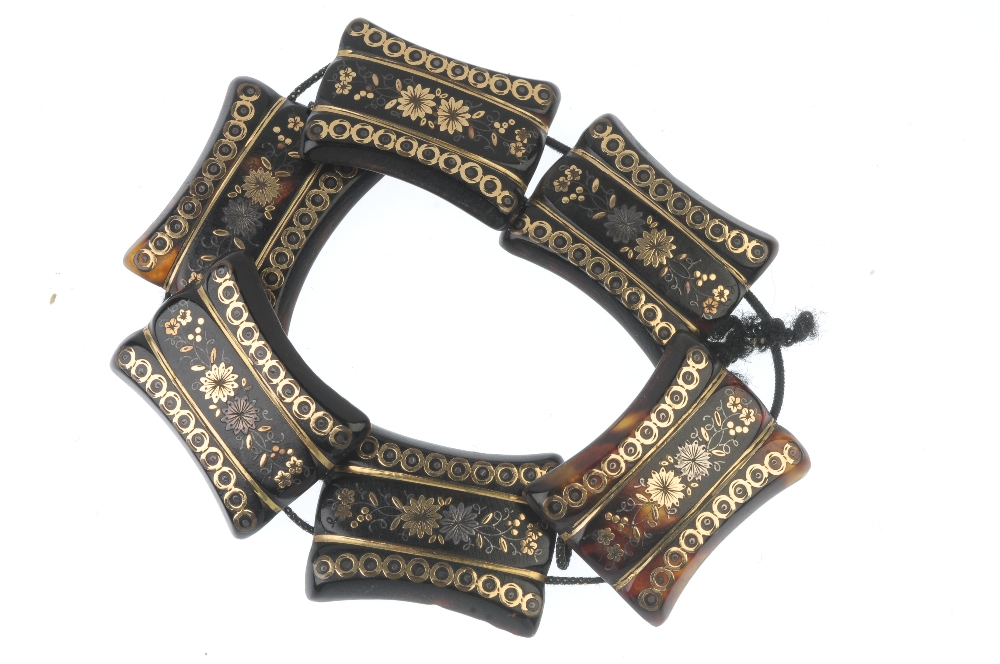 A late 19th century tortoiseshell pique bracelet. Designed as a series of tapered tortoiseshell - Image 2 of 2