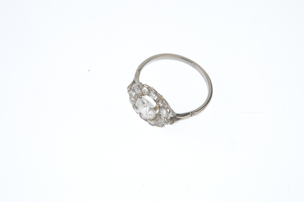 A mid 20th century diamond cluster ring. The old-cut diamond, within a similarly-cut diamond - Image 2 of 3