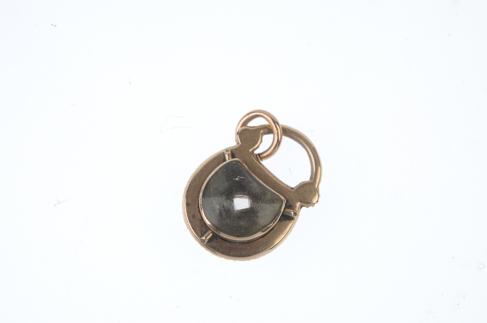 A mid 19th century gold split pearl memorial locket. Of padlock design, the woven hair panel, with - Image 2 of 2