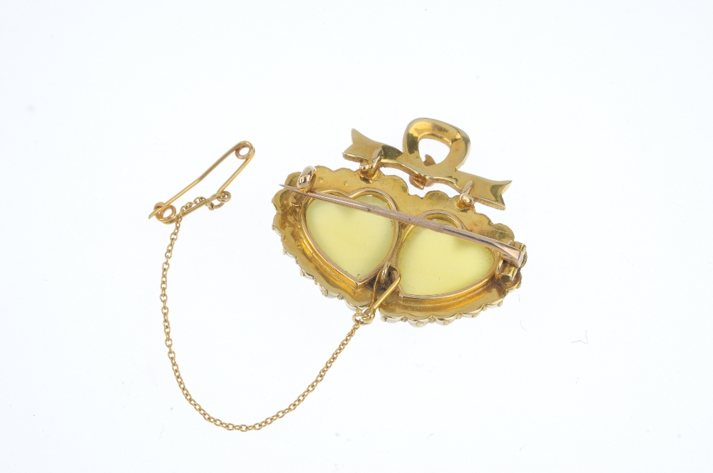 An early 20th century gold chrysoberyl and split pearl brooch. The replacement heart-shape - Image 2 of 3