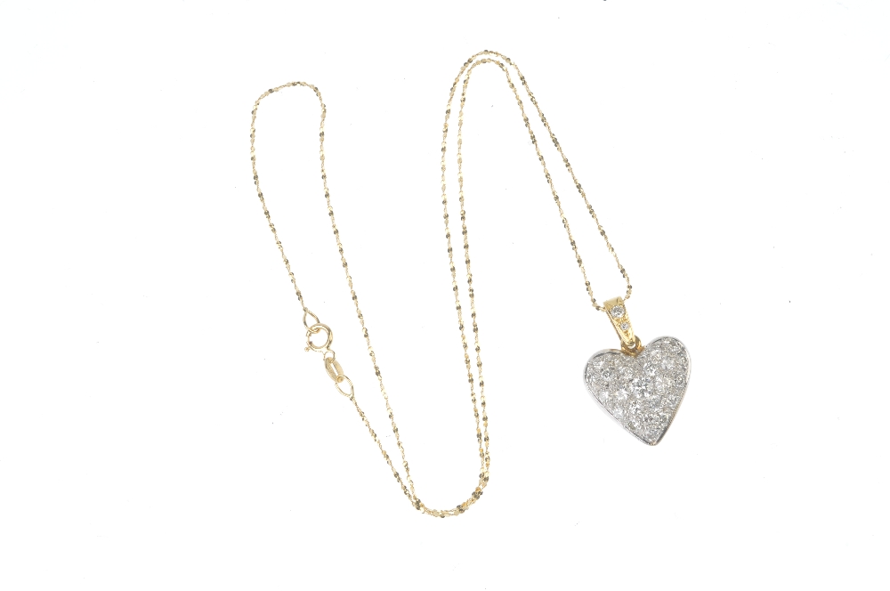 An 18ct gold diamond pendant. The pave-set brilliant-cut diamond heart, to the similarly-cut diamond - Image 3 of 3