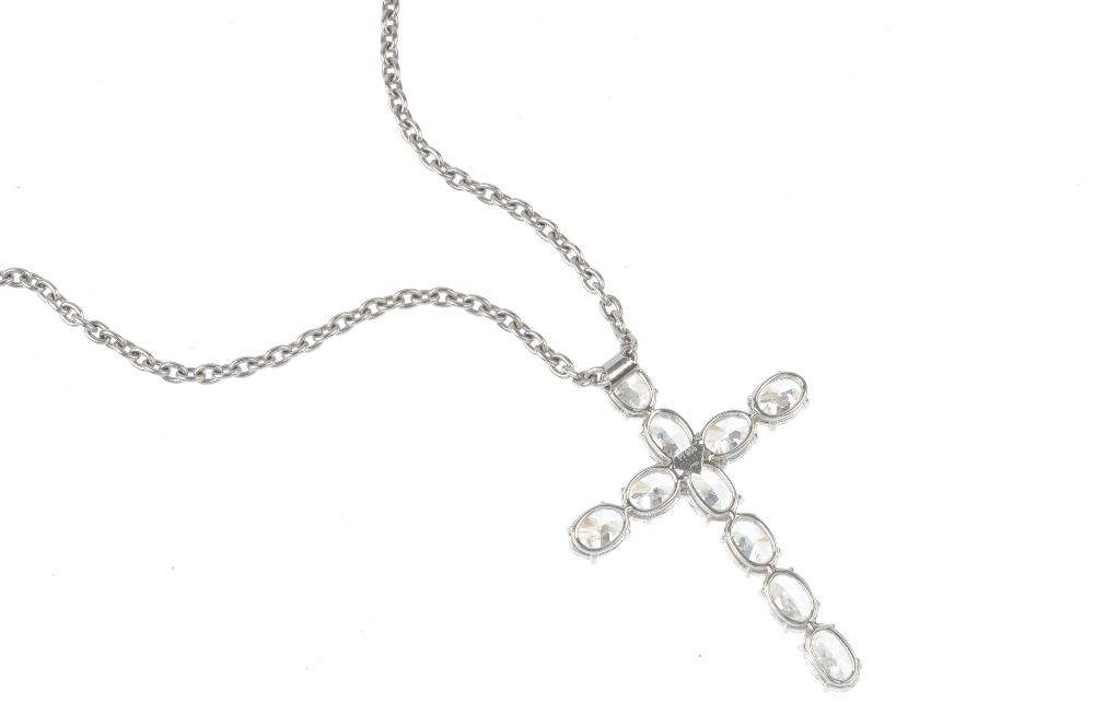 A diamond cross pendant. Designed as a series of oval-shape diamonds, suspended from a belcher- - Image 2 of 3