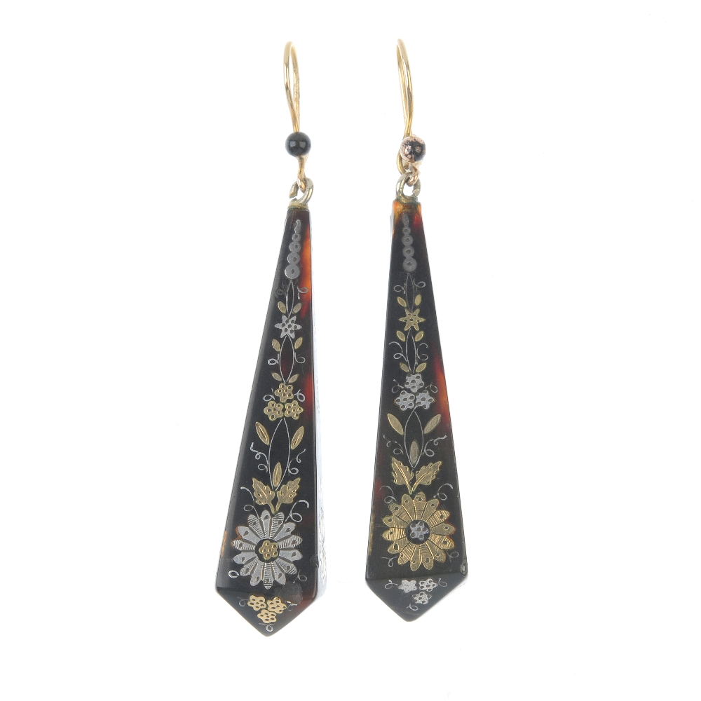 A pair of late 19th century pique tortoiseshell ear pendants. Each designed as a tapered foliate