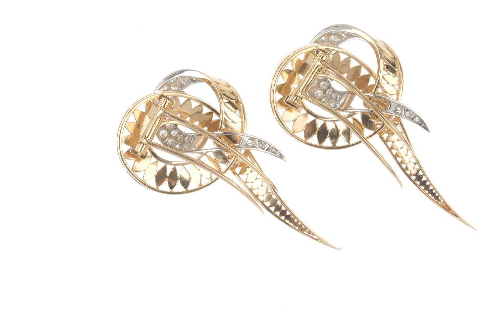 A pair of 1970s diamond clips. Each designed as an openwork stylised knot with pave-set diamond - Image 2 of 2