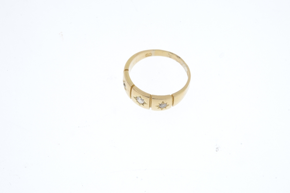 A late Victorian 18ct gold diamond three-stone ring. The graduated old and single-cut diamond star - Image 2 of 3