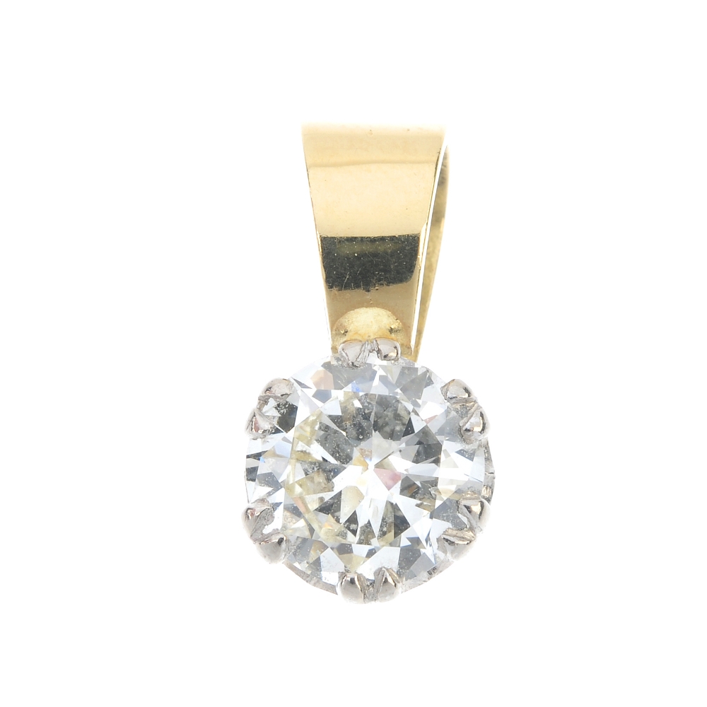 A diamond single-stone pendant. The brilliant-cut diamond, to the tapered surmount. Estimated