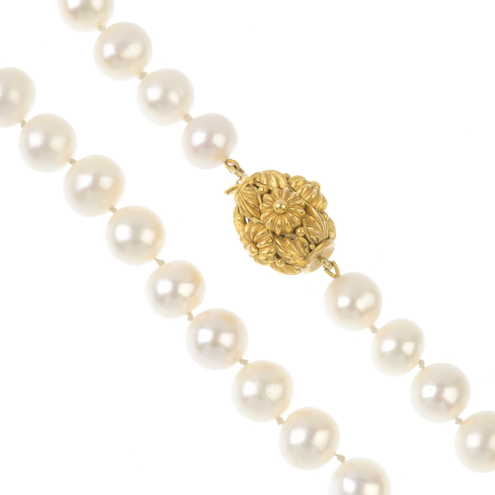 A cultured pearl single-strand necklace. Comprising thirty-four cultured pearls, measuring
