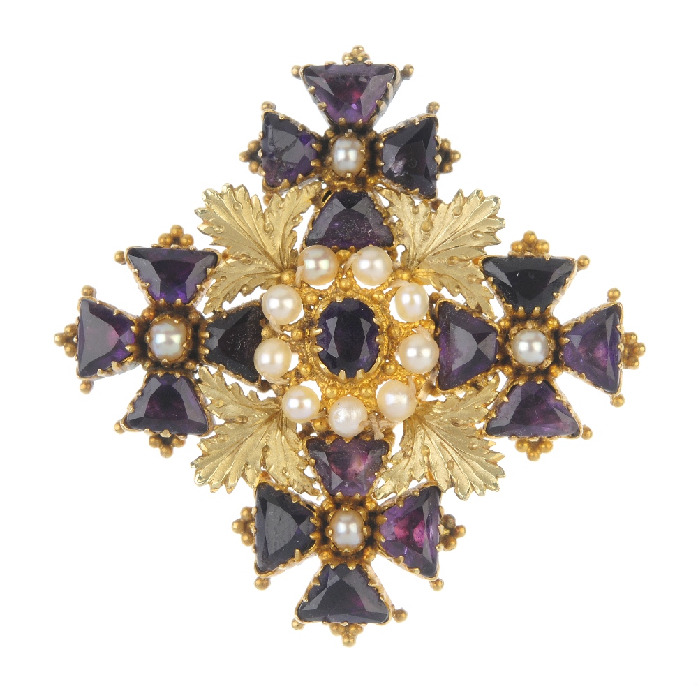 An amethyst and seed pearl brooch. The oval-shape amethyst and seed pearl cluster, with fancy-