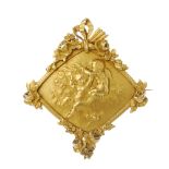 An early 20th century foliate panel brooch. Of kite-shape outline, depicting a cherub scene, to