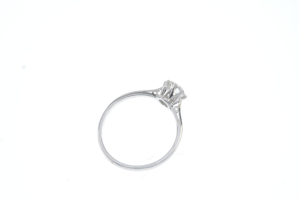 A diamond single-stone ring. The circular-cut diamond, to the tapered shoulders and plain band. - Image 3 of 3