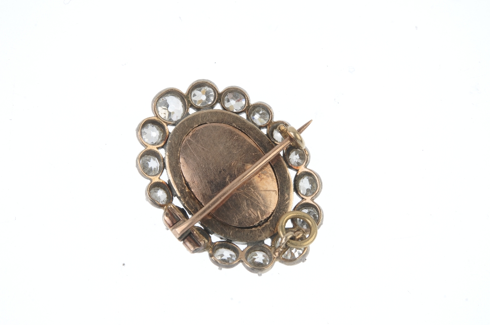 An early 19th century diamond brooch mount. The oval-shape void central panel, within a rose-cut - Image 2 of 2