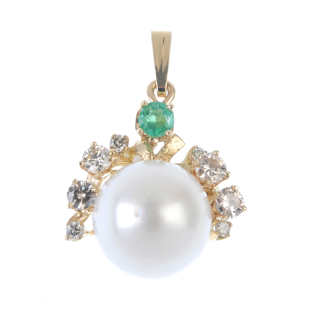 A cultured pearl, emerald and diamond pendant. The cultured pearl, measuring 13mms, with brilliant-