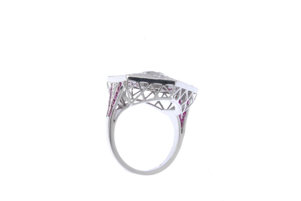 An 18ct gold diamond and ruby ring. Of hexagonal outline, the brilliant-cut diamond, within an - Image 3 of 3