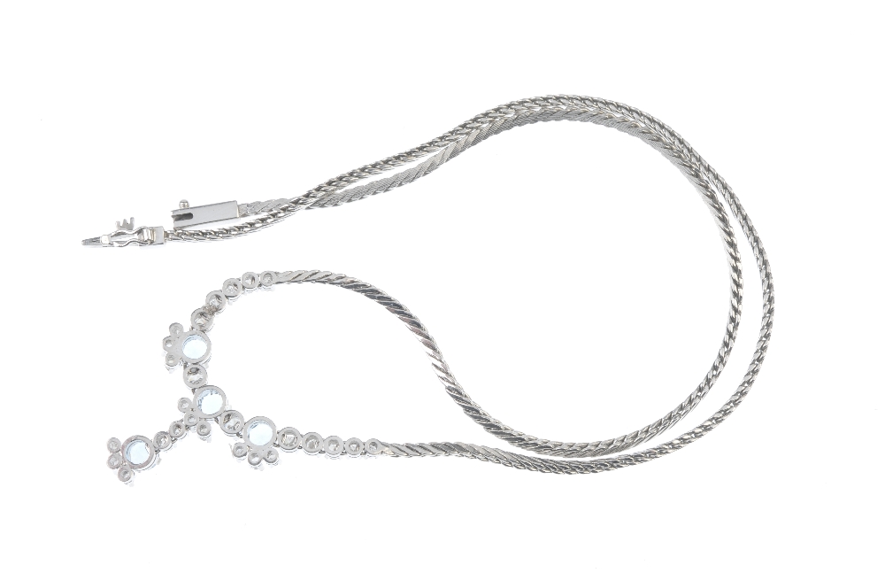 An aquamarine and diamond necklace. The front designed as a series of circular-shape aquamarines, - Image 2 of 2