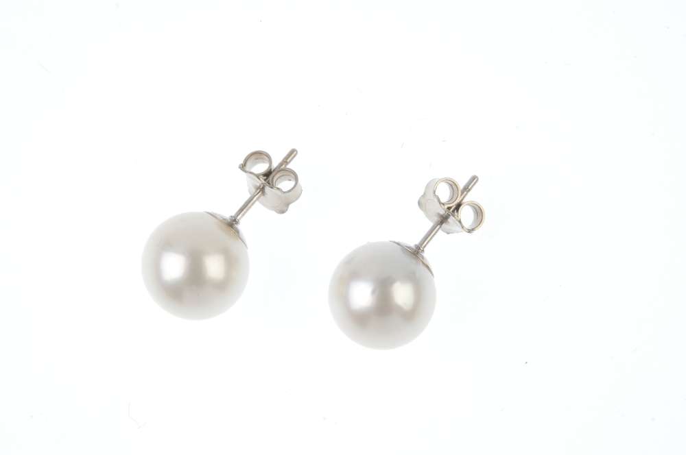 A pair of cultured pearl ear studs. Cultured pearls measuring 11 and 10.9mms. Weight 4.8gms. Overall - Image 2 of 2