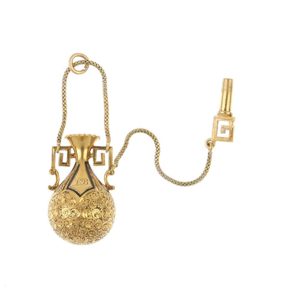 A mid Victorian 18ct gold enamel amphora pendant, circa 1860. The engraved scrolling body, with