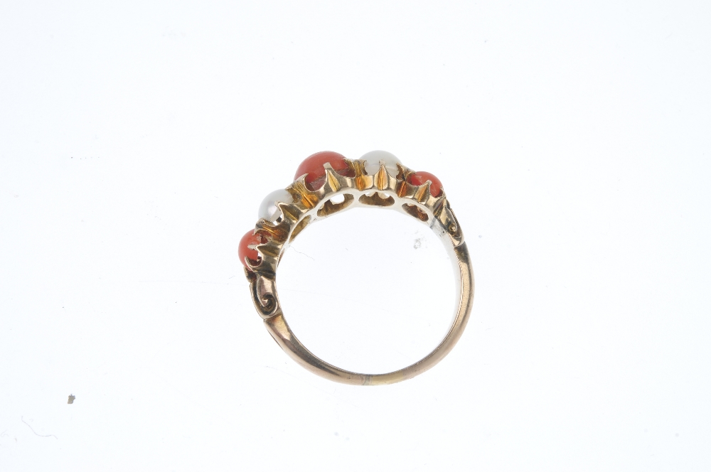 A coral and split pearl ring. The alternating graduated oval and circular coral cabochon and split - Image 3 of 3