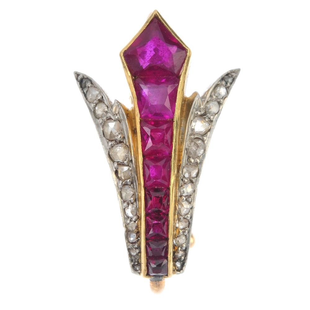 An early 20th century ruby and diamond surmount. The tapered vari-shape ruby line, with rose-cut