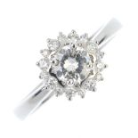 An 18ct gold diamond floral cluster ring. The brilliant-cut diamond, weighing 0.50ct, within a