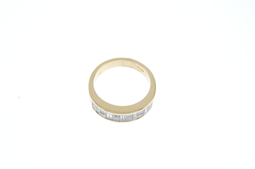 An 18ct gold diamond half-circle eternity ring. Designed as a series of baguette-cut diamonds, - Image 2 of 3