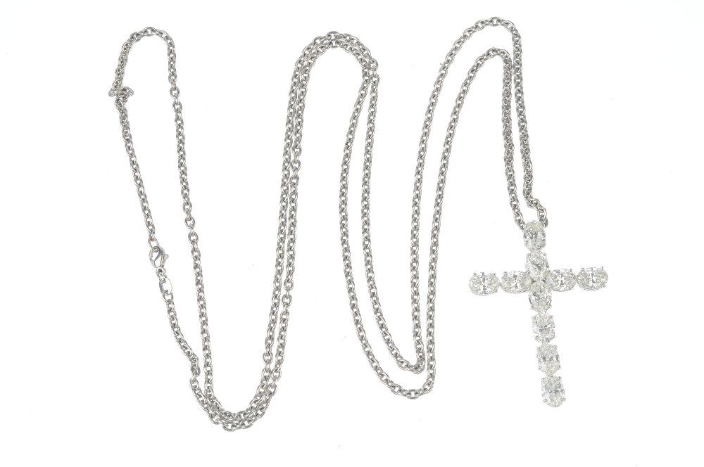 A diamond cross pendant. Designed as a series of oval-shape diamonds, suspended from a belcher- - Image 3 of 3
