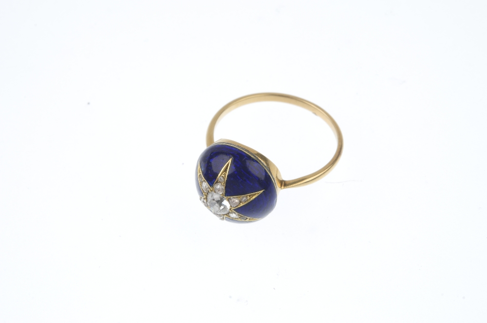 An 18ct gold diamond and enamel star ring. The late 19th century gold old and rose-cut diamond - Image 2 of 3