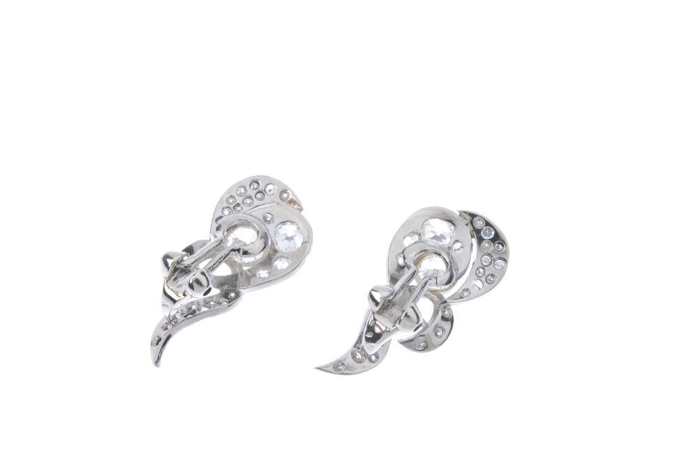 A pair of diamond earrings. Each designed as a circular-cut diamond collet, within an old and - Image 2 of 2