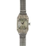 A lady's early 20th century platinum diamond cocktail watch, with associated 9ct gold bracelet.