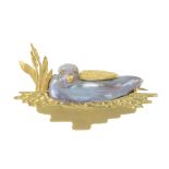 A cultured pearl novelty brooch. The baroque cultured pearl, decorated with textured wing, beak
