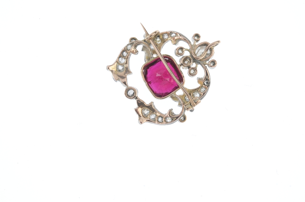 A late 19th century silver and gold, tourmaline and diamond brooch. The cushion-shape pinkish-red - Image 2 of 2
