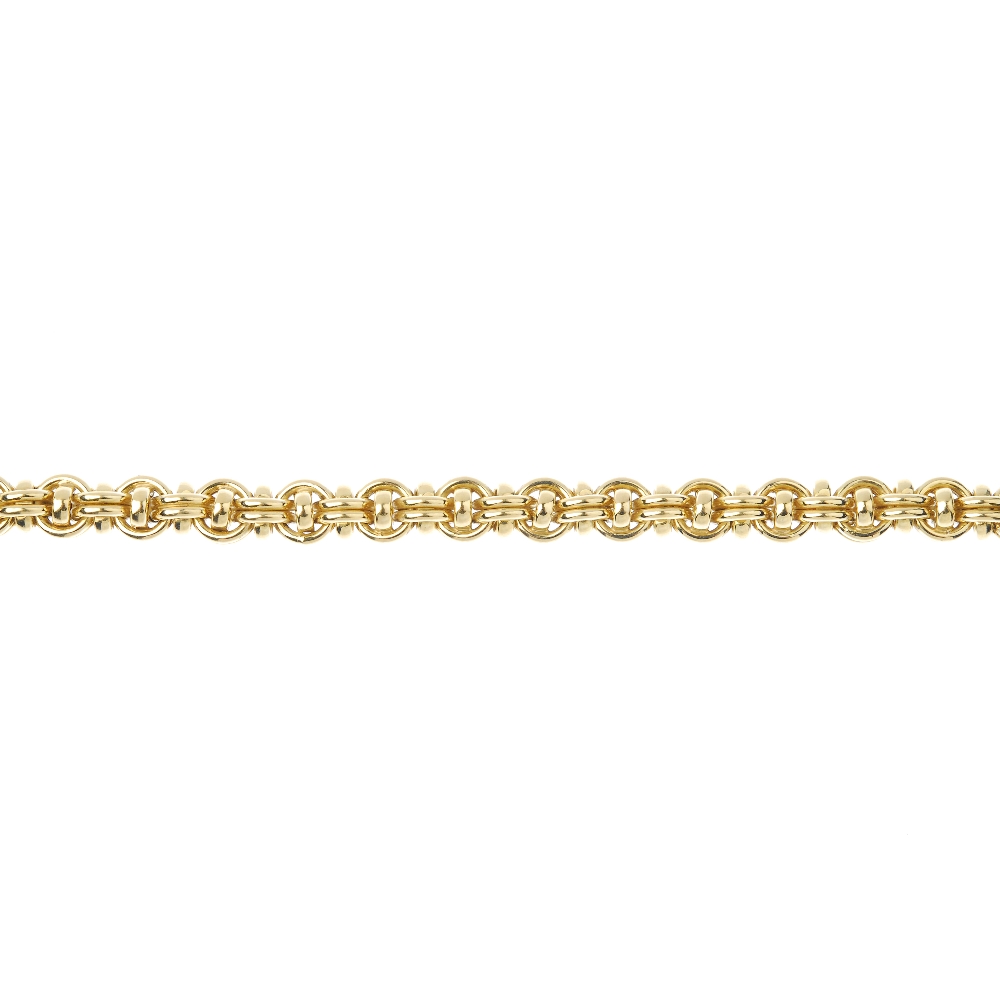 A bracelet. The double belcher-link chain with oval-shape spacers, to the spring-ring clasp.