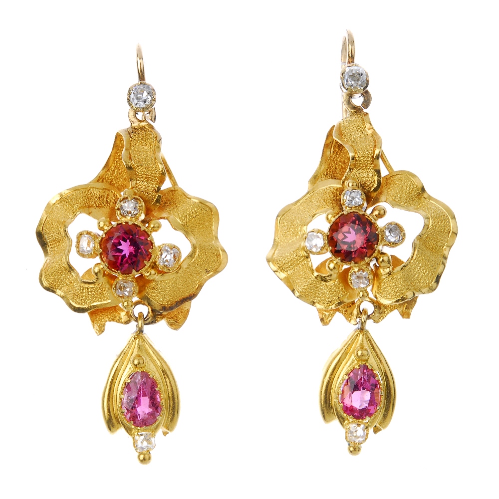 A pair of diamond and garnet ear pendants. Each designed as a pear-shape garnet and old-cut