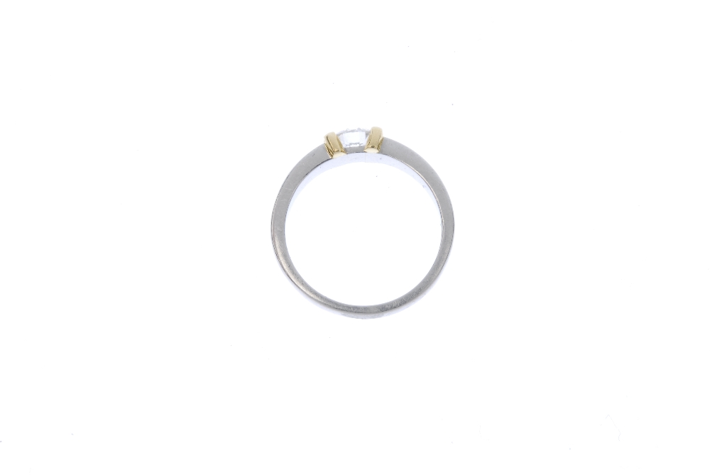 A platinum diamond single-stone ring. Of bi-colour design, the brilliant-cut diamond, with bar - Image 3 of 3
