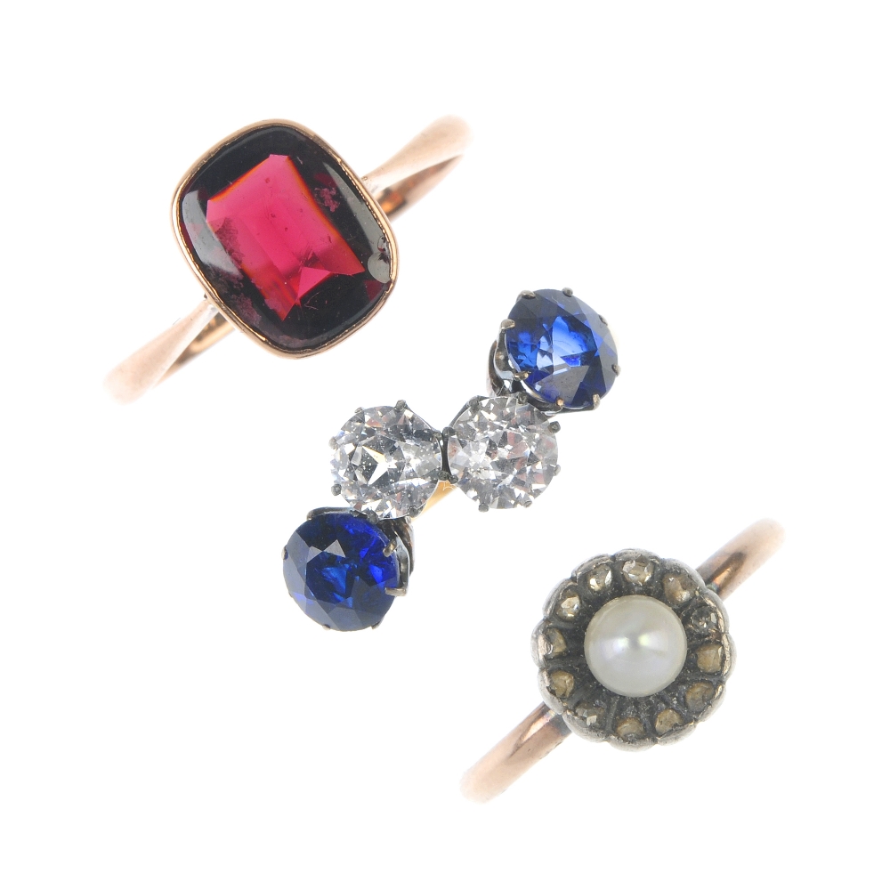 A selection of three early 20th century gem-set rings. To include a cultured pearl and diamond
