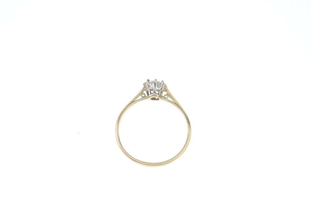 A diamond single-stone ring. The brilliant-cut diamond, to the tapered sides and plain band. - Image 3 of 3