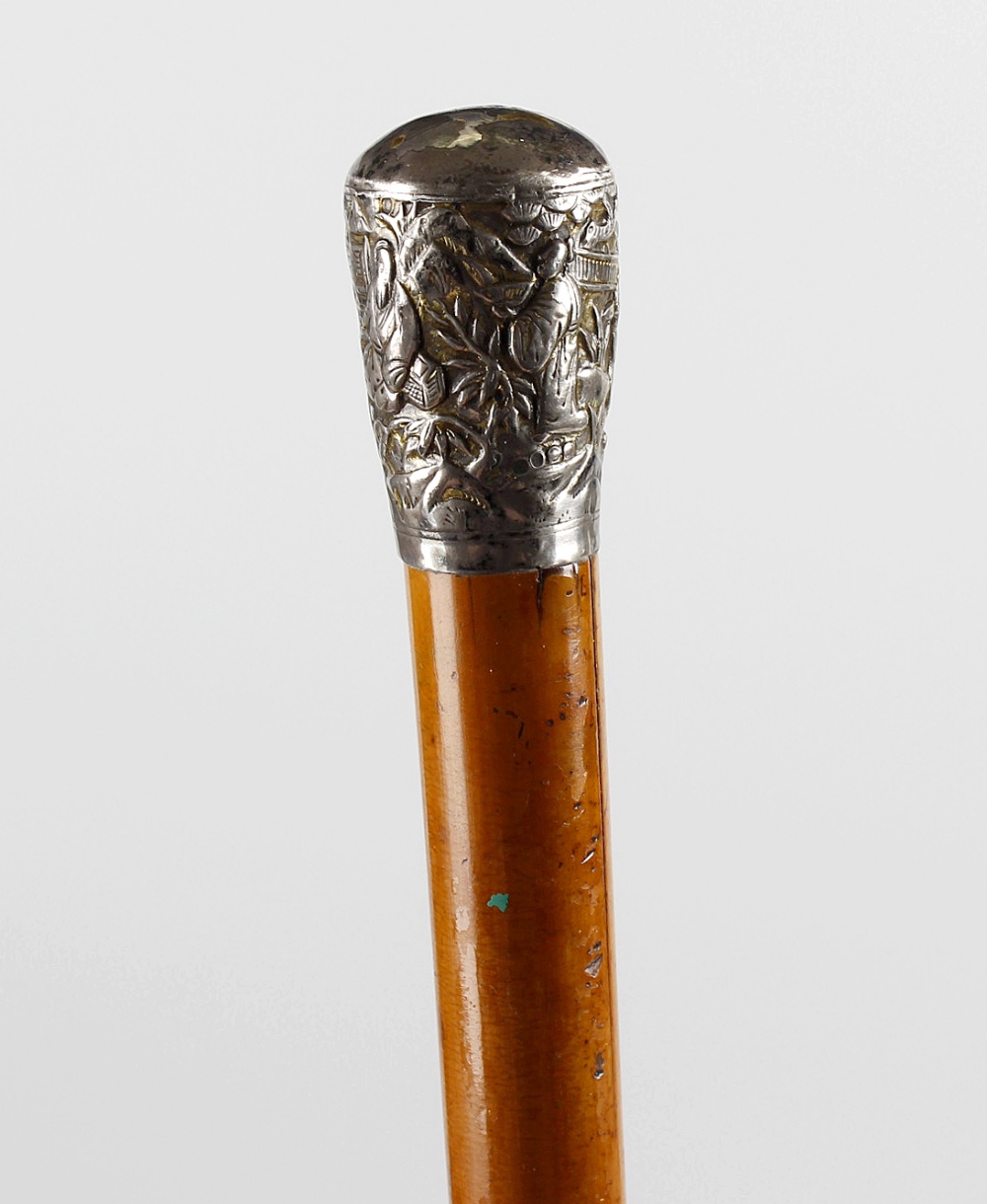 A 19th century Chinese malacca walking stick, carved with a snake and frog, together with another