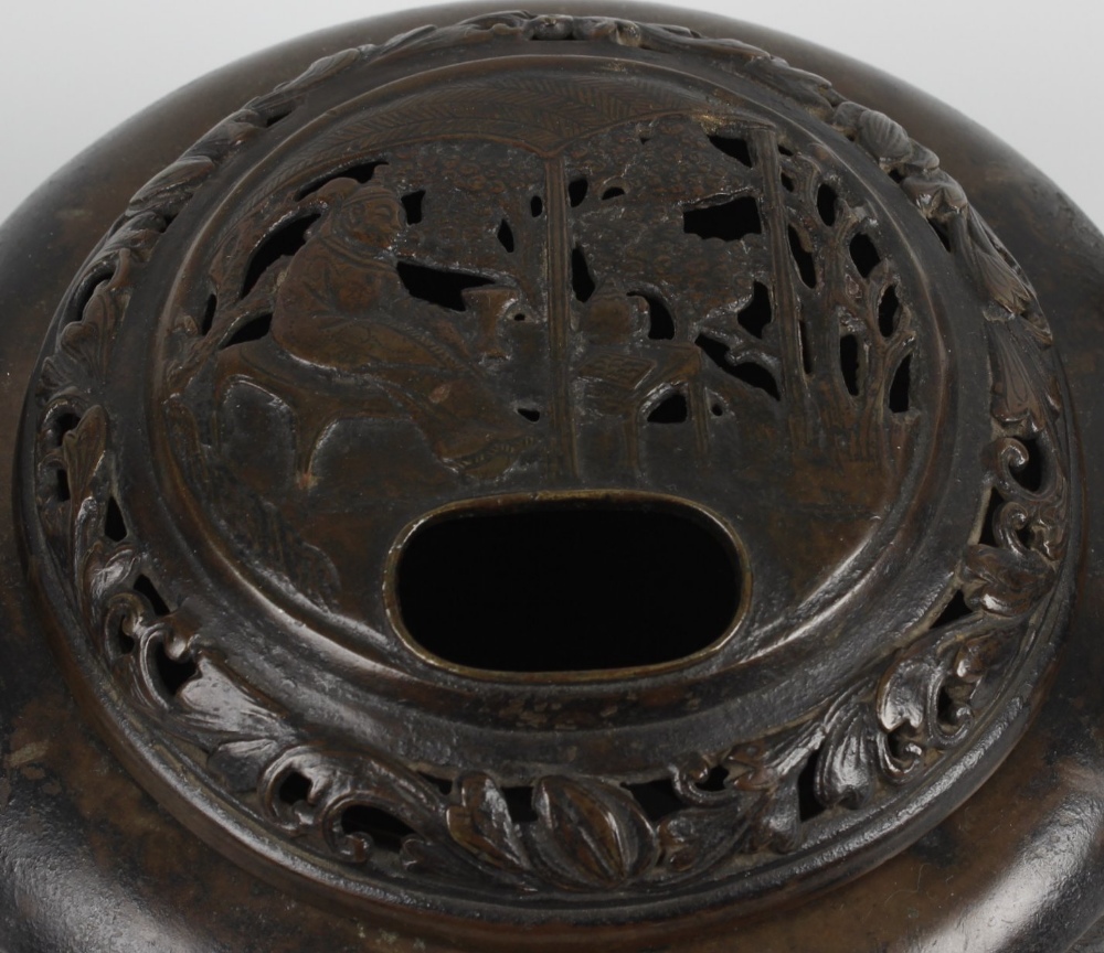 A large bronze incense burner and cover, the domed pierced lid depicting an elder seated among - Image 2 of 4
