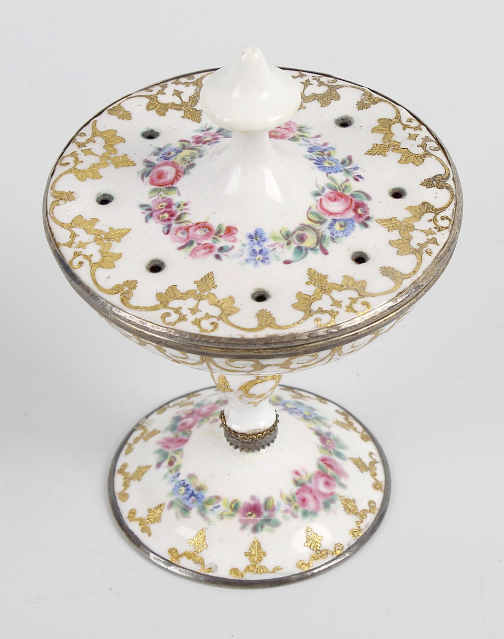 A 19th century French enamel pomander, having a pierced circular cover over a shallow dish raised