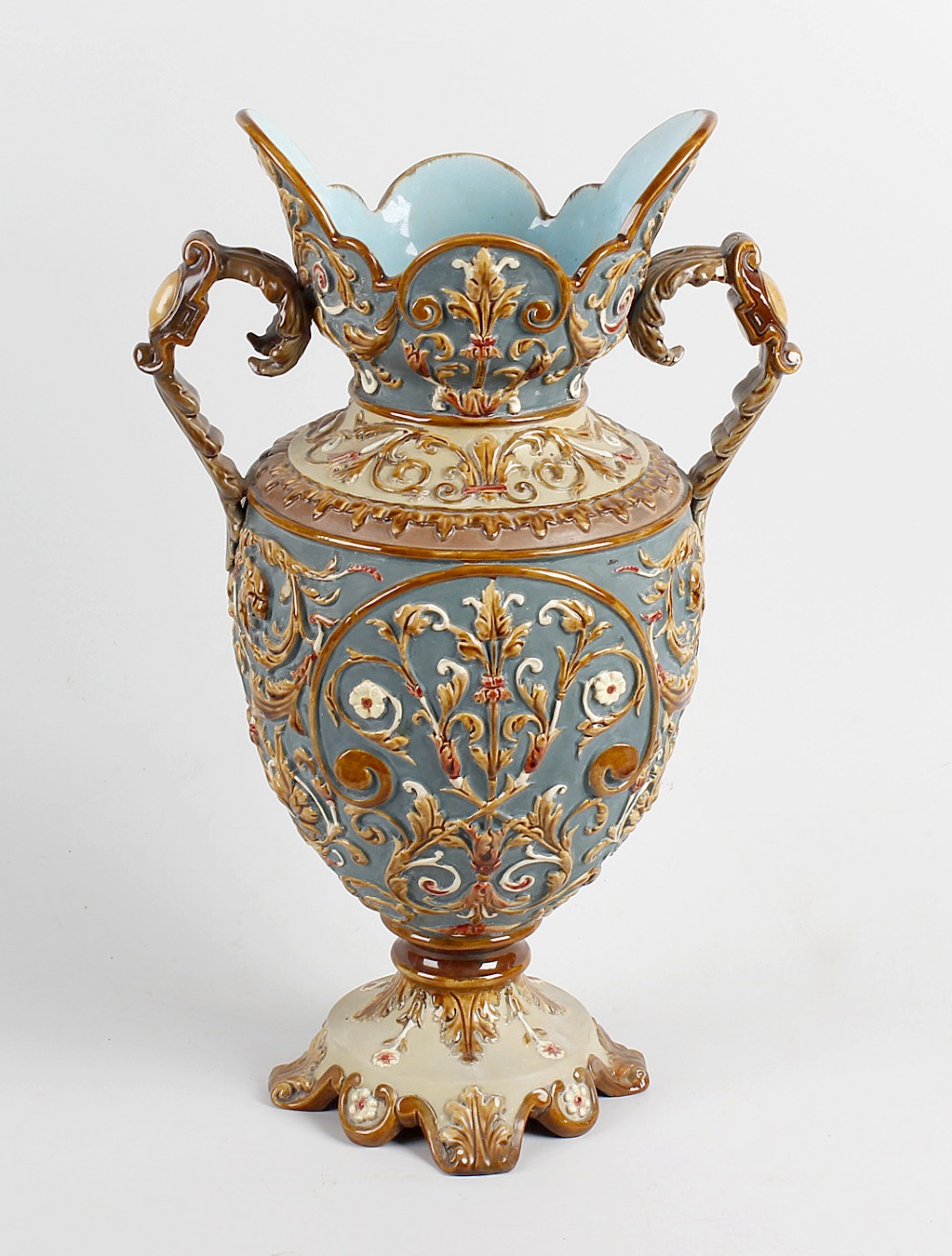 An Austrian majolica twin handled vase, Wilhelm Schiller & Son, of ovoid form having twin acanthus