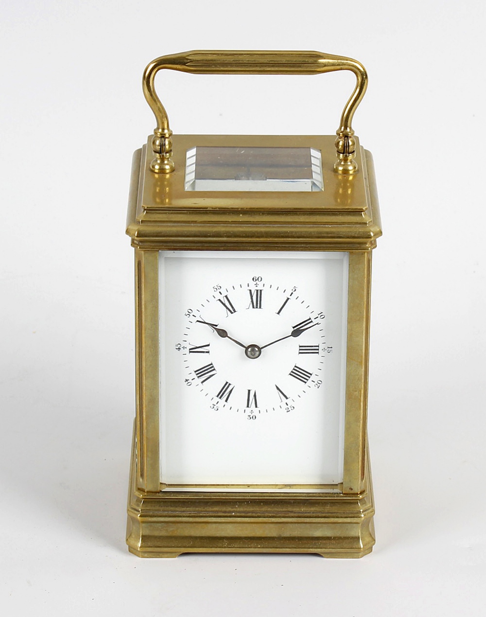 A French brass-cased carriage clockRichard & Cie. The 2.75-inch white dial with Roman hours and