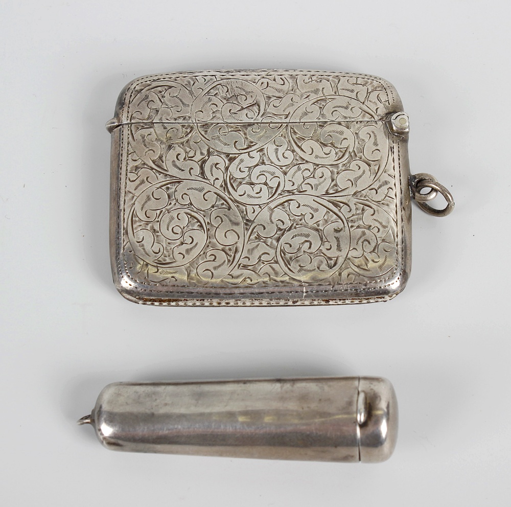 Two items of Birmingham hallmarked silver. Comprising a vesta case with foliate decoration, 1913,