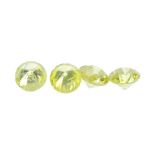 A selection of brilliant-cut colour treated 'yellow' diamonds, total weight 0.83ct. Approximate size