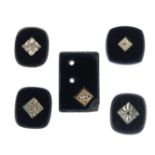 A selection of ring components, consisting mostly of onyx and diamond panels. Some gemstones