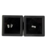 Three vari-cut diamonds. To include a rectangular-shape diamond, weighing 0.34ct, together with
