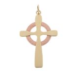 CLOGAU - a 9ct gold cross pendant. Of bi-colour design, the tapered cross, with circular textured