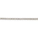 (112531) A diamond line bracelet. The brilliant-cut diamond line, with crossover gallery and