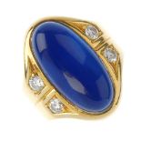 (117589) A dyed agate and diamond dress ring. The curved oval dyed blue agate cabochon, with
