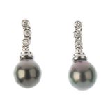 A pair of 18ct gold cultured pearl and diamond ear pendants. Each designed as a cultured pearl,